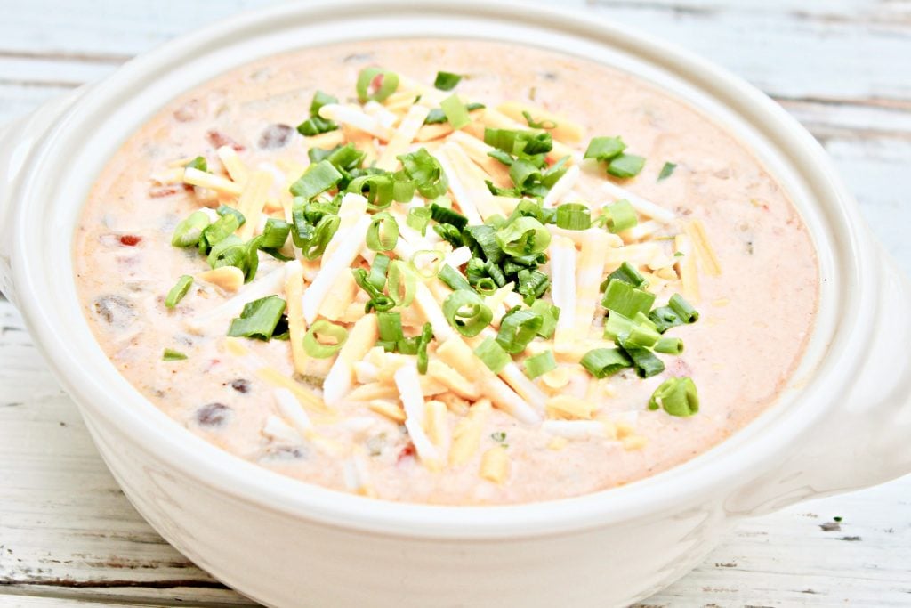 Creamy Black Bean Taco Soup ~ Easy and dairy-free cheesy weeknight dinner packed with black beans, onions, tomatoes, green chiles, and taco seasonings. If you like loaded queso, you're going to love this taco soup!