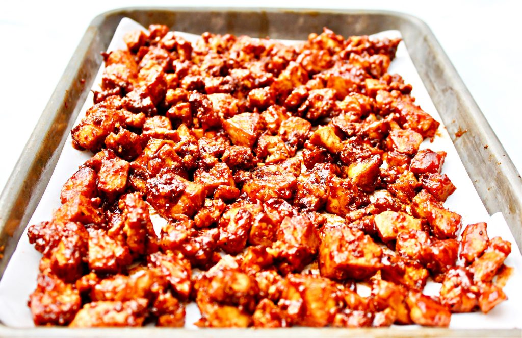 Twice-Baked BBQ Tofu ~ Bite-size tofu seasoned with smoky spices and BBQ sauce. Sticky sweet and perfectly caramelized BBQ tofu.