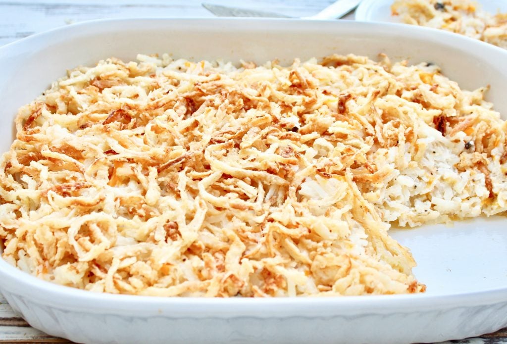 Hash Brown Casserole ~ This easy to make, classic breakfast casserole is dairy-free, contains no canned soup, and is perfect for brunch, holiday breakfasts, baby showers, and more!  Shredded hash brown potatoes are baked in a creamy mixture that includes dairy-free cheeses, sour cream, and fresh mushrooms. All topped off with a layer of fresh and crispy fried onions.