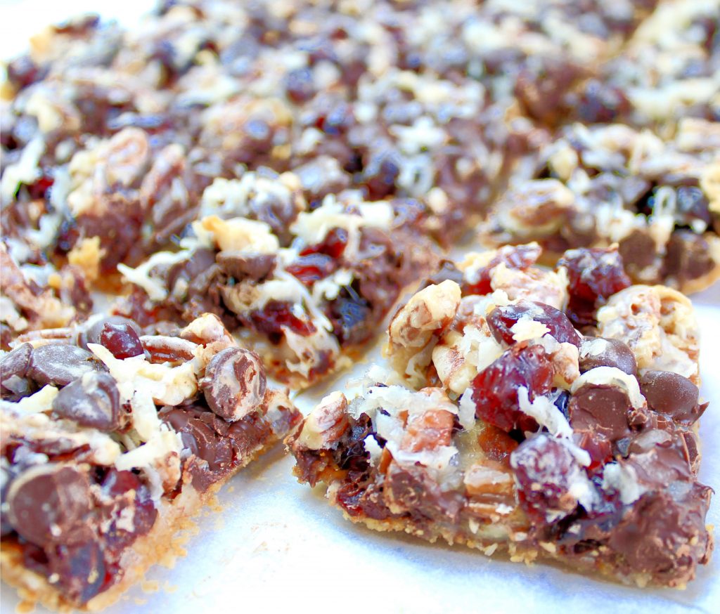 Magic Cookie Bars ~ 7 ingredients are all you need to make this dairy-free and vegan holiday dessert classic!