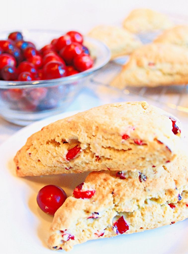 Cranberry Scones ~ Classic scones infused with the festive flavor of cranberries are easy to make and add a pretty pop of color to any holiday breakfast or brunch!