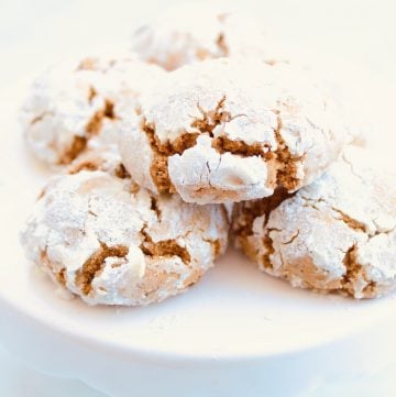 Gingerbread Crinkle Cookies ~ Santa is going to love these gingerbread cookies! They're rich with classic gingerbread flavor, pillowy soft, perfectly spiced, and taste like Christmas!