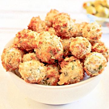 Air Fried Olives ~ Pimento-stuffed green olives are coated in batter then air fried for a healthier alternative to traditional pan-fried olives. A quick and easy appetizer ready to serve in about 15 minutes!