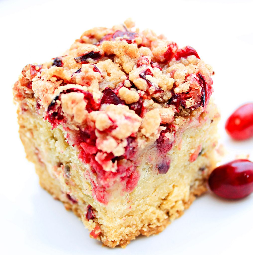 Cranberry Coffee Cake ~ A light vanilla coffee cake made with fresh, tart cranberries and a cranberry streusel topping. Perfect for holiday brunches, baby showers, and coffee or tea time at home!
