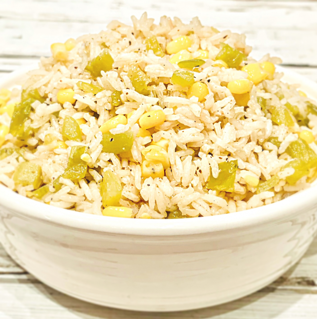 Corn and Green Chile Rice ~ The perfect accompaniment to your favorite Mexican dishes! This easy to make and budget-friendly side dish is ready to serve in just 30 minutes!