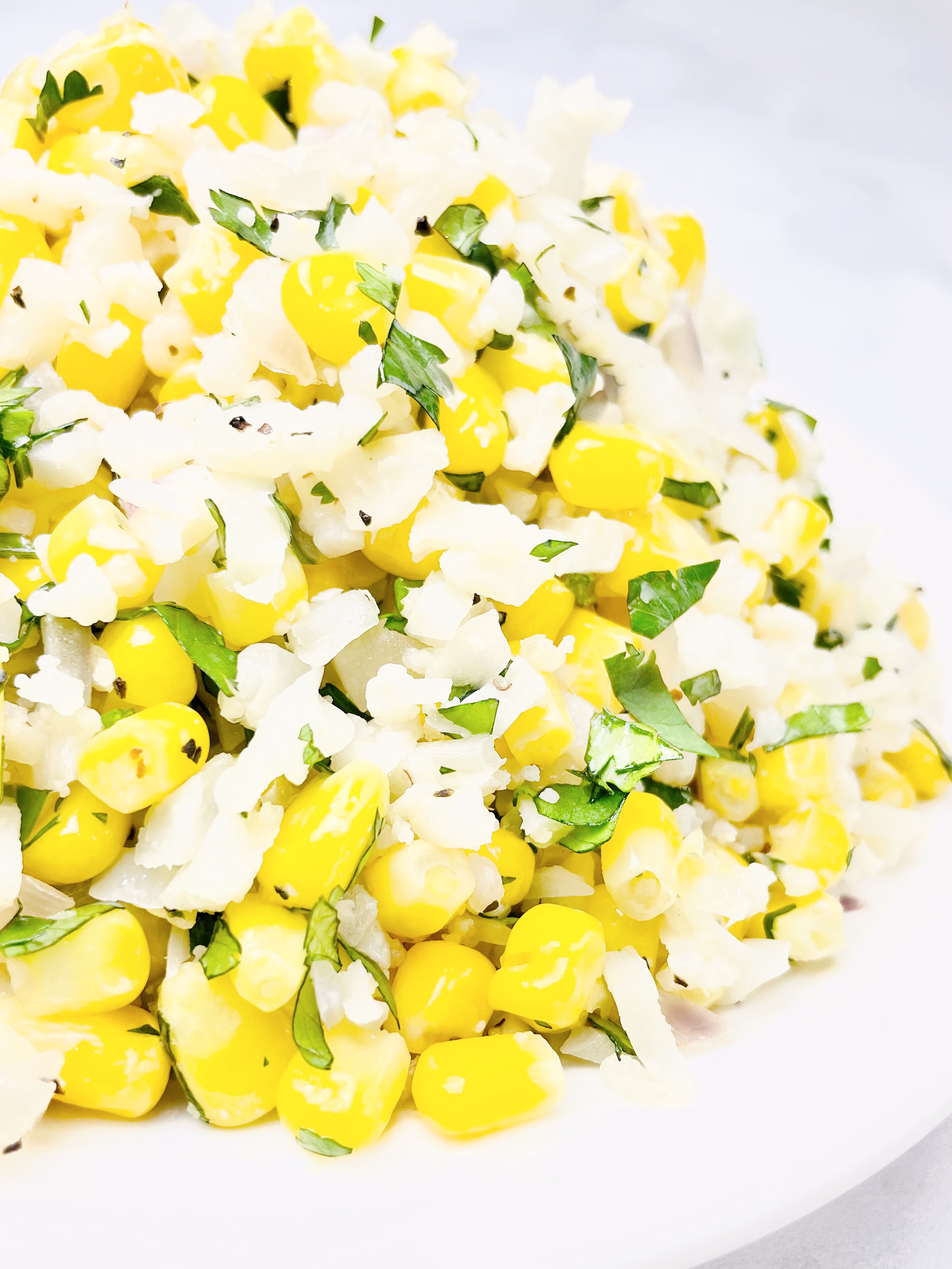 Corn and Cilantro Cauliflower Rice ~ An easy low-carb dish that is light, flavorful, and ready to serve in 15 minutes or less!