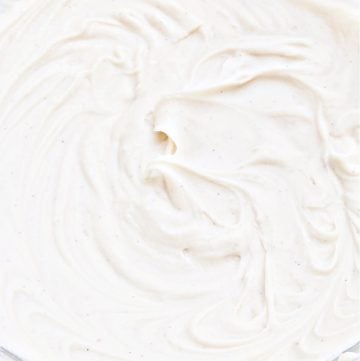 Vegan Cream Cheese Frosting ~ A rich and creamy dairy-free frosting made with 4 simple ingredients. This frosting is perfect for the holidays and everyday desserts, including carrot cake, red velvet cake, and even cookies!