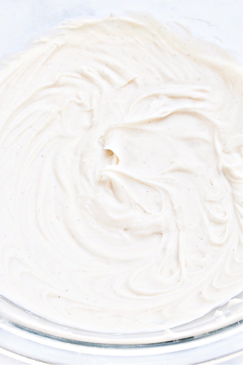 Vegan Cream Cheese Frosting ~ A rich and creamy dairy-free frosting made with 4 simple ingredients. This frosting is perfect for the holidays and everyday desserts, including carrot cake, red velvet cake, and even cookies!