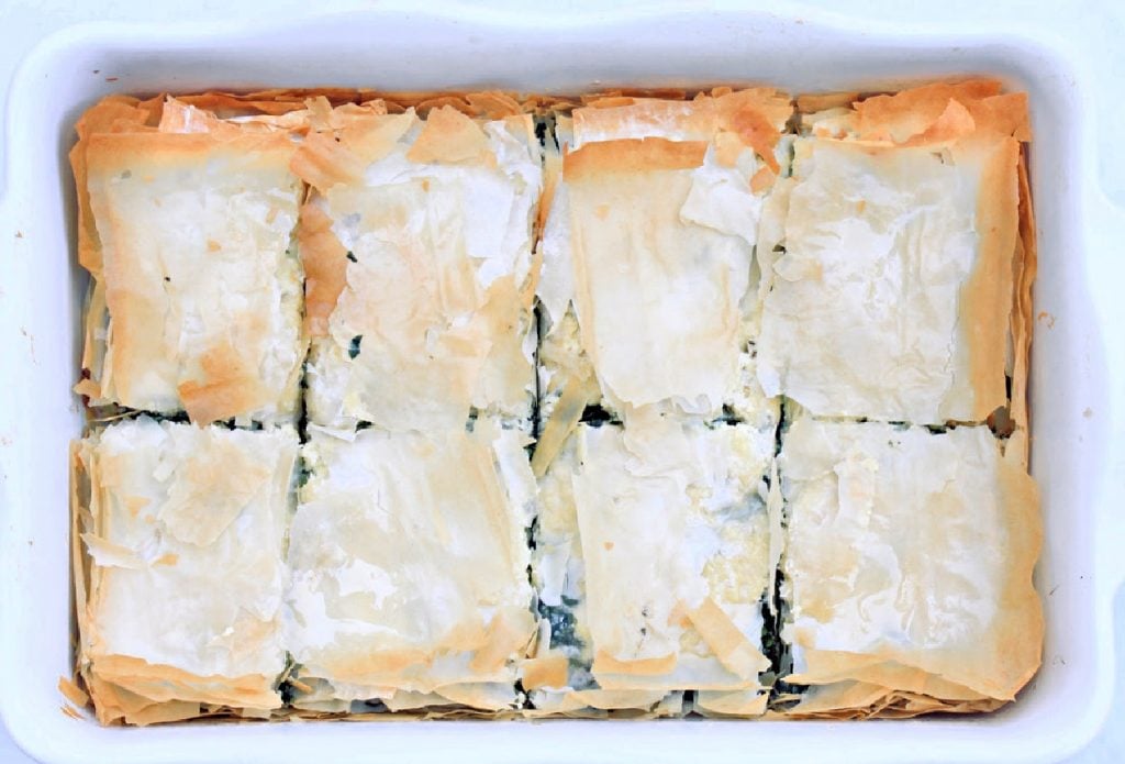 Vegan Spanakopita ~ A savory and aromatic Greek-style main dish or hearty appetizer packed with spinach and vegan feta cheese between layers of crispy phyllo dough.