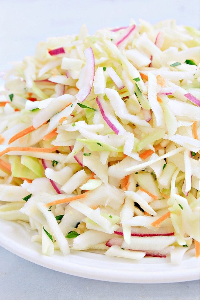 Mexican coleslaw with cabbage, red onion, jalapeno, cilantro, and lime.