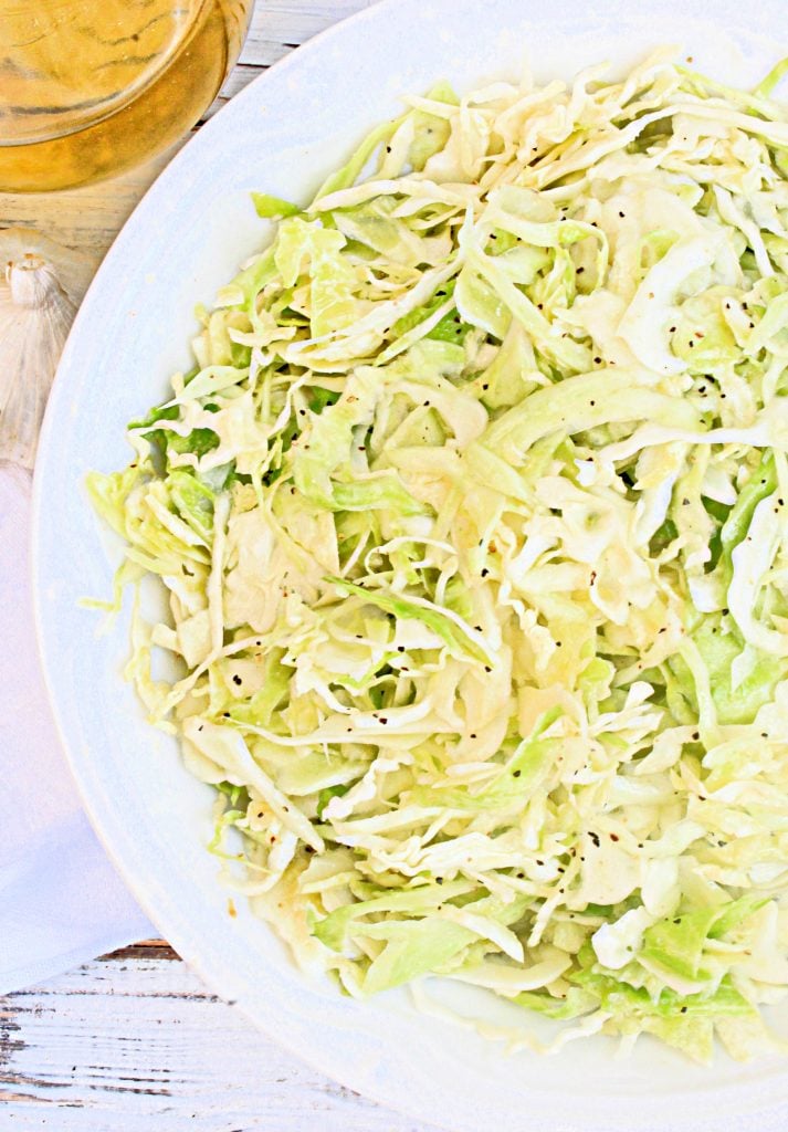 Oil and Vinegar Coleslaw ~ A cool and crisp, mayonnaise-free coleslaw made with simple ingredients! Ready to serve in about 20 minutes!