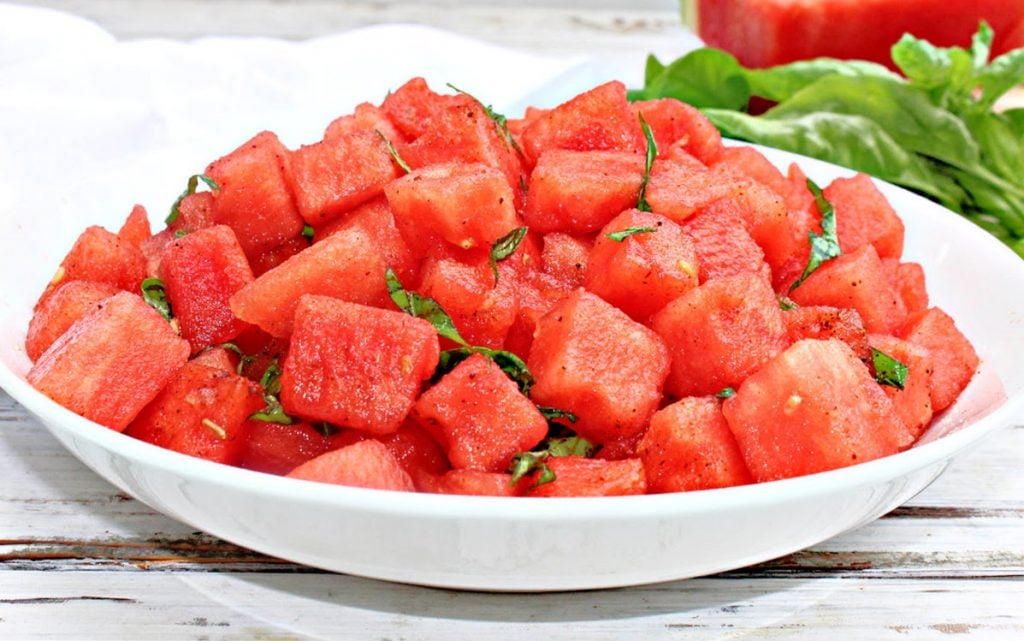 Watermelon Basil Salad is light, refreshing, and simple to make! Chili powder, lemon, & salt counterbalance the sweetness of the watermelon.