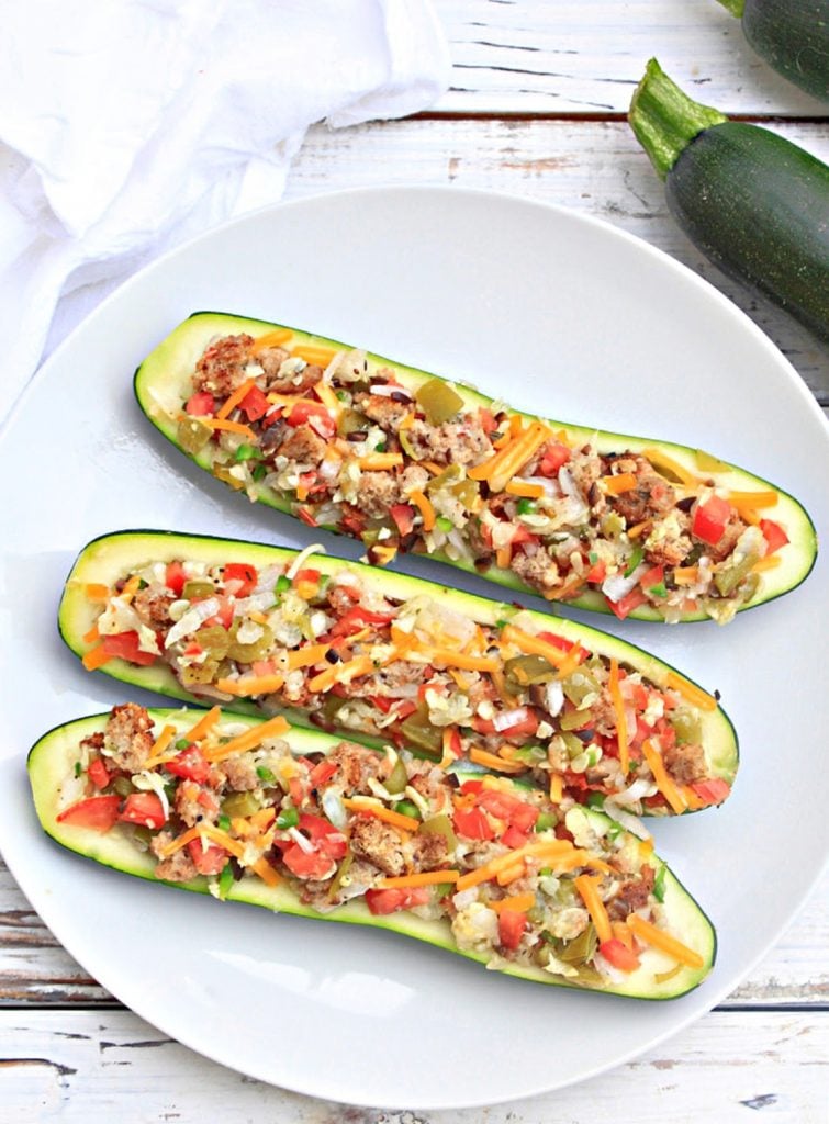 Baked Zucchini Boats ~ These garden-fresh zucchini stuffed with veggies serve 4 as a light main course or 8 as a side dish.