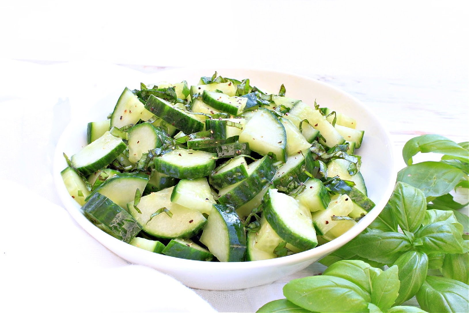 Cucumber and Basil Salad ~ Simple ingredients and minimal prep work make this easy and fresh side dish a summertime winner!