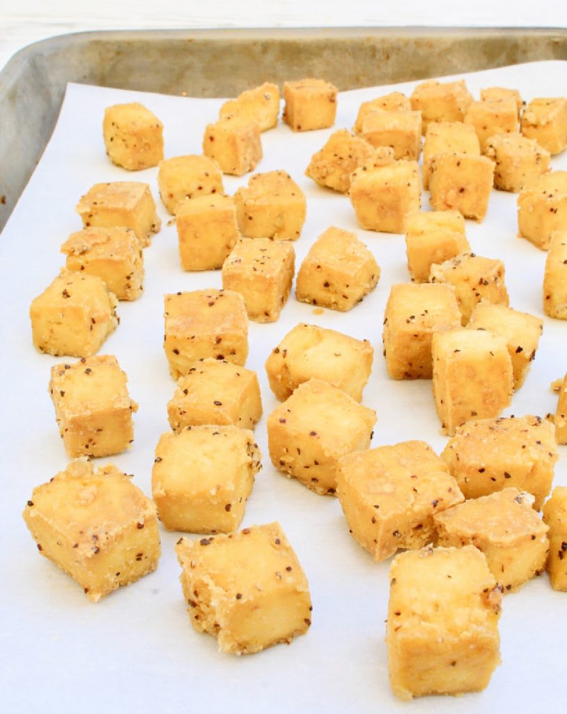 Crispy Baked Tofu ~ Cubed tofu tossed with simple seasonings and baked to golden perfection. Uncomplicated, flavorful, and so easy!