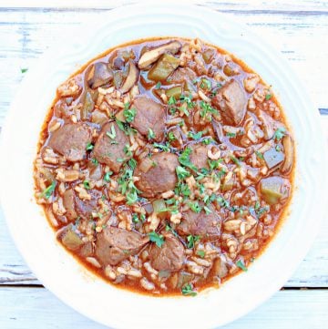 Vegan Beef and Rice Stew ~ A hearty and flavorful one-pot meal that is sure to satisfy! Ready to serve in just 30 minutes!