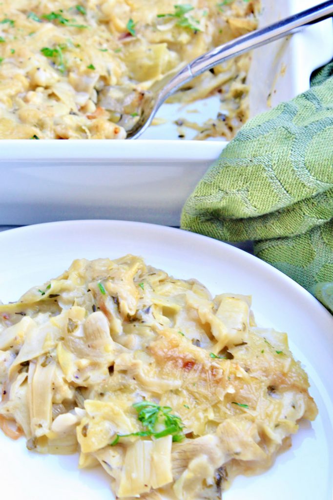 Artichoke Gratin ~ Artichokes smothered in a savory, creamy, dairy-free sauce then baked until bubbly. Simple and elegant for the holidays!