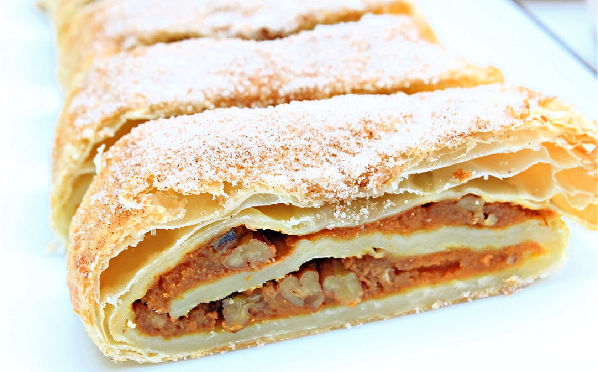 Pumpkin Strudel ~ Puff pastry dough is layered with pumpkin, walnuts, and savory spices of the season then baked until golden!