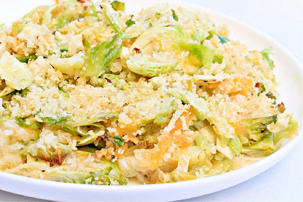 Brussels Sprouts Gratin ~ An easy and elegant, vegan Brussels sprouts casserole side dish made with two kinds of dairy-free cheeses, simple seasonings, and a crispy Panko breadcrumb topping. You'll love this delicious Thanksgiving side dish recipe!