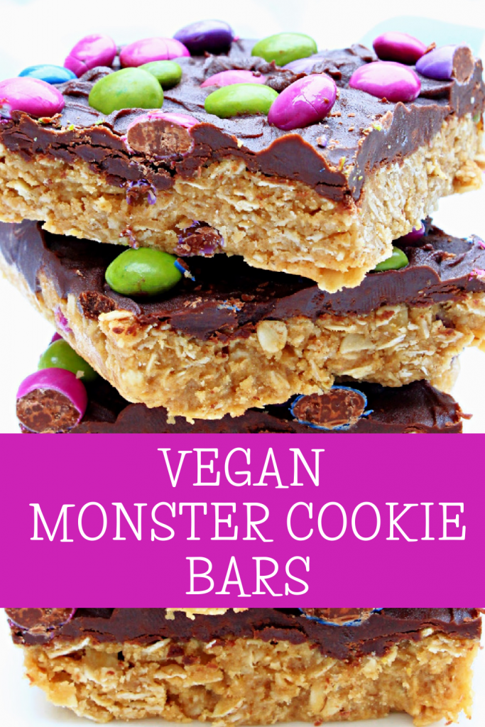 Vegan Monster Cookie Bars ~ Peanut butter and oatmeal cookie dough smothered in chocolate and studded with colorful candies is an easy, no-bake dessert treat that is frightfully delicious!