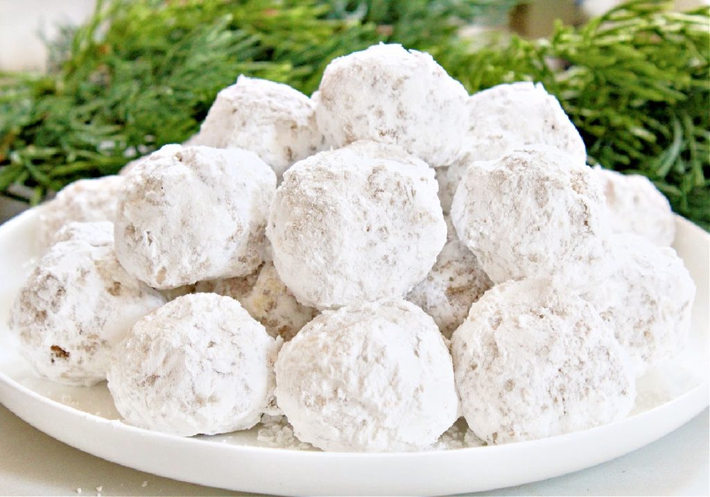Italian Wedding Cookies ~ These delicate and nutty, dairy-free shortbread cookies rolled in powdered sugar pair especially well with coffee or hot tea!
