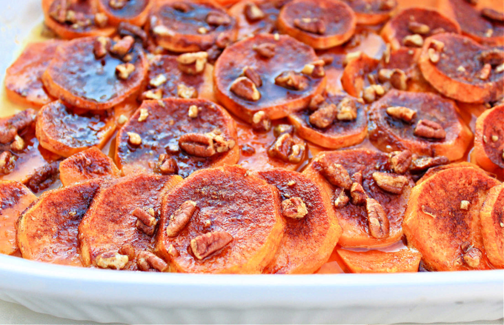 Candied Sweet Potatoes ~ Easy to make with simple ingredients. Your guests will love this sweet and satisfying holiday classic!