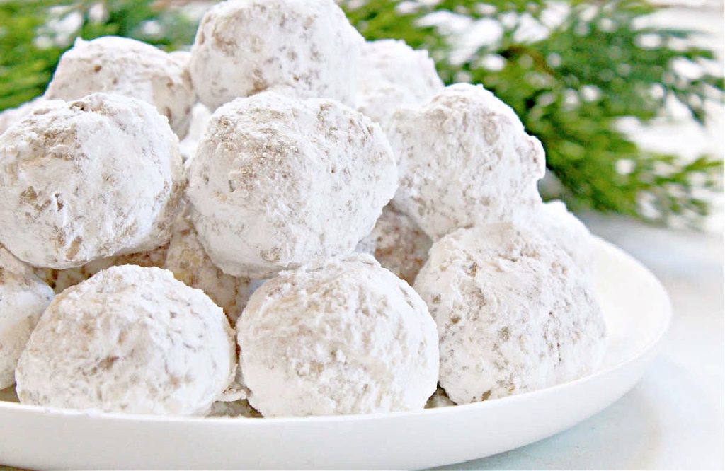 Italian Wedding Cookies ~ These delicate and nutty, shortbread cookies rolled in powdered sugar pair especially well with coffee or hot tea!