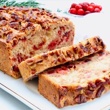 Cranberry Banana Bread ~ A festive and flavorful spin on classic banana bread and a great way to use leftover cranberry sauce!