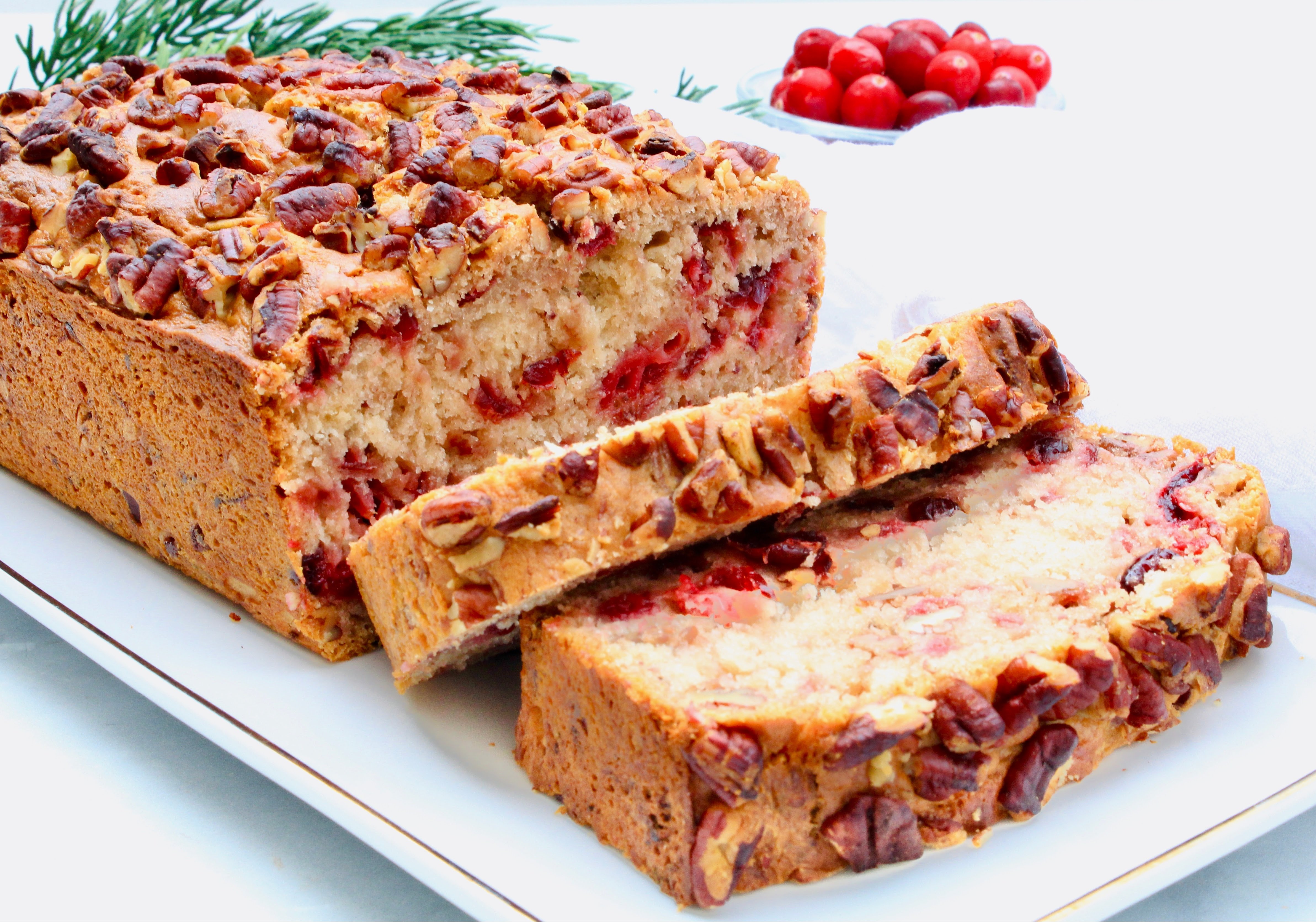 Cranberry Banana Bread ~ A festive and flavorful spin on classic banana bread and a great way to use leftover cranberry sauce!