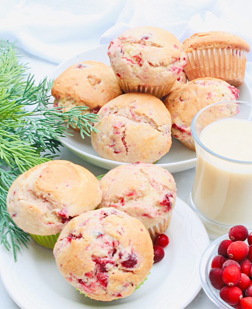 Cranberry Eggnog Muffins! Simple and sweet muffins with dairy-free eggnog and whole berry cranberry sauce. Perfect for the holiday season!
