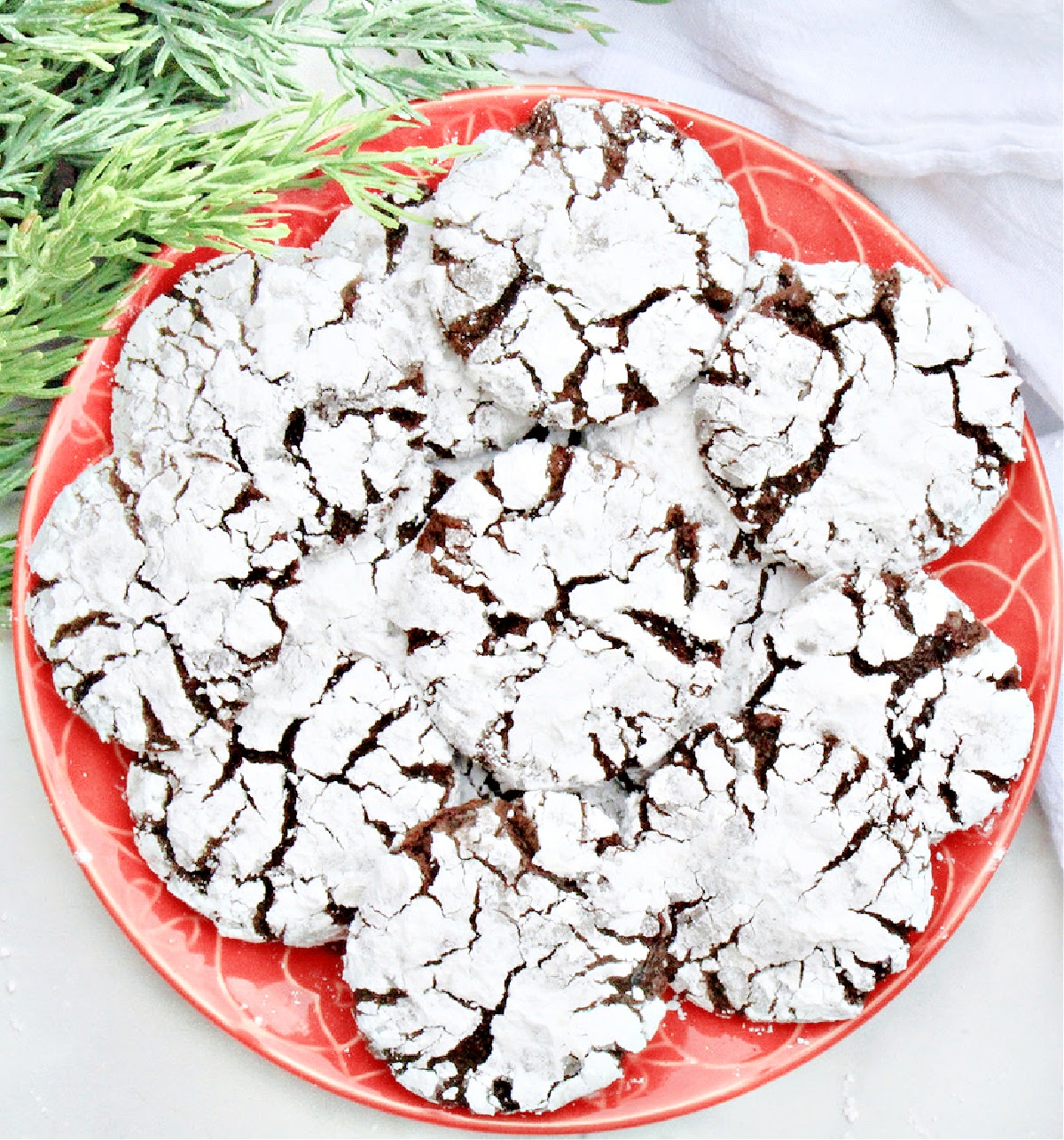 Dark Chocolate Crinkle Cookies ~ These classic Christmas cookies are soft, rich, and sweet with fudgy centers and layers of powdered sugar. Perfect for holiday snacking!