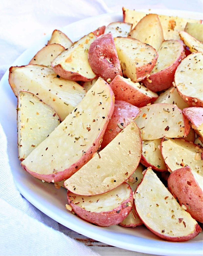 Italian Roasted Potatoes ~ Red potatoes tossed with simple ingredients. Easy, budget-friendly, and goes with just about everything!