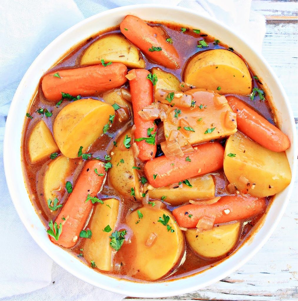 Irish Stew ~ A plant-based Irish stew made with simple seasonings, onions, carrots, and potatoes simmered in a savory Guinness beer broth.