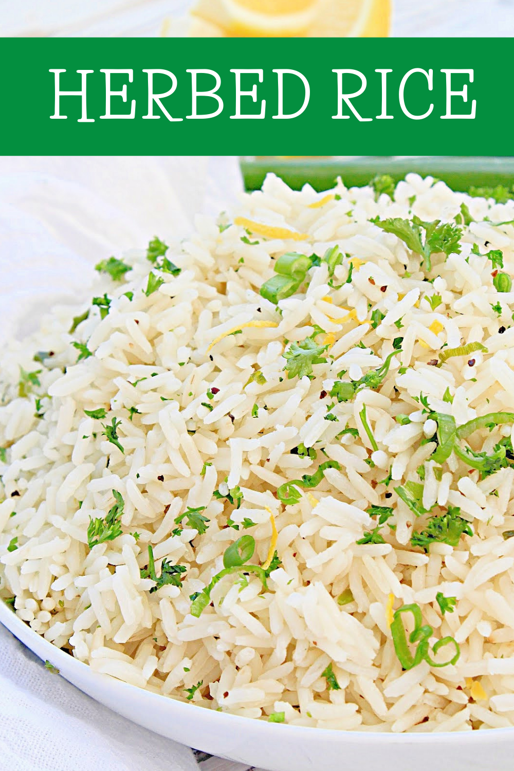 Herbed Rice ~ Fluffy white rice is elevated with the flavors of fresh herbs, simple seasonings, and a hint of lemon. Easy to make and pairs well with a variety of cuisines! via @thiswifecooks