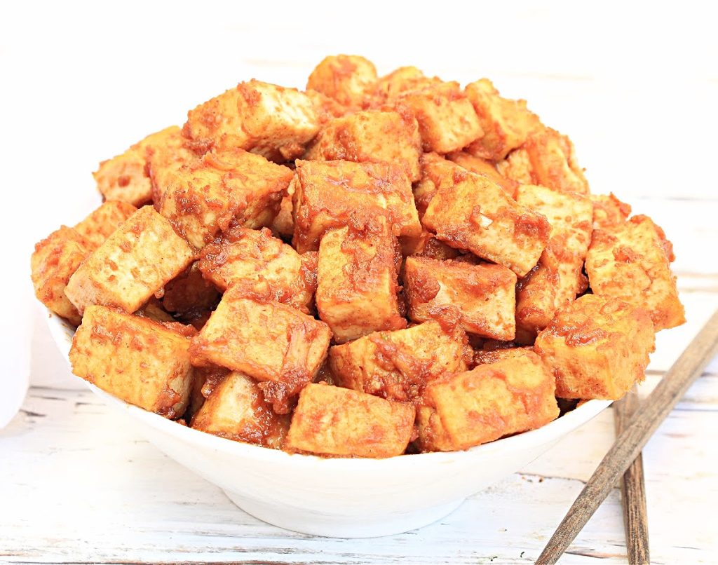 Pan-fried tofu tossed in a simple and savory 5-ingredient almond butter sauce.