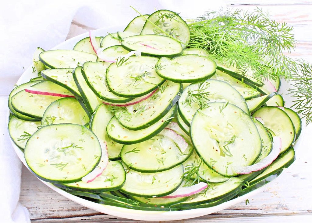 Dill Cucumber Salad (Gurkensalat) ~ Cool, refreshing, and crisp salad with sliced cucumbers and fresh dill in an easy vinegar-based dressing!