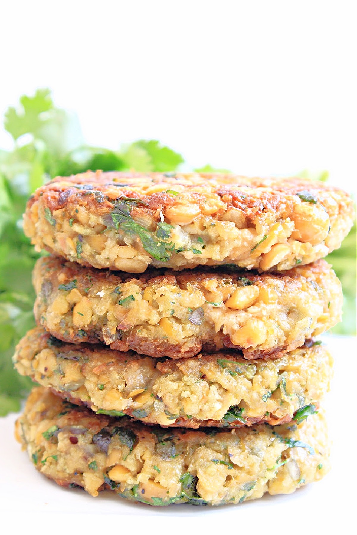 Chickpea Burgers ~ These vegan veggie burgers are quick and easy to make with simple ingredients. Ready to serve in 20 minutes!