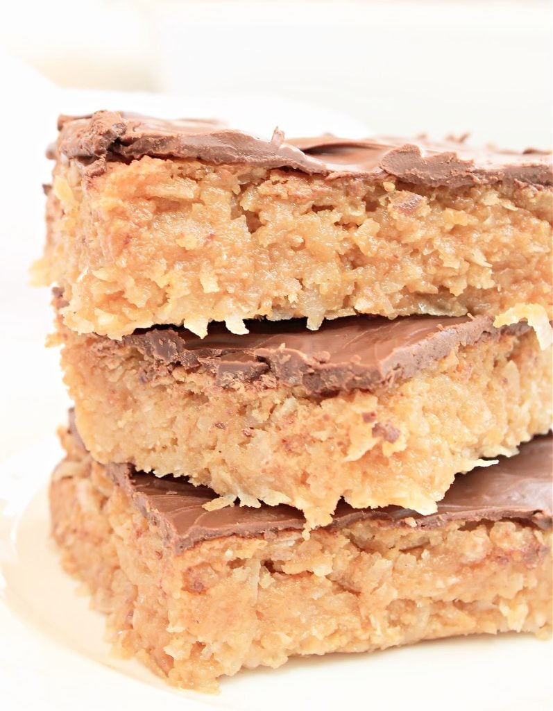 Chocolate Covered Coconut Bars ~ These rich and gooey bars will satisfy any sweet tooth candy craving!