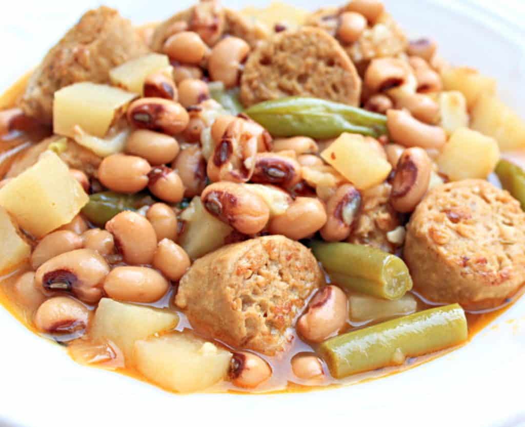Vegan Black-Eyed Pea and Bratwurst Stew ~ Easy to make with plant-based ingredients and perfect for Oktoberfest, game days, and all your fall celebrations!