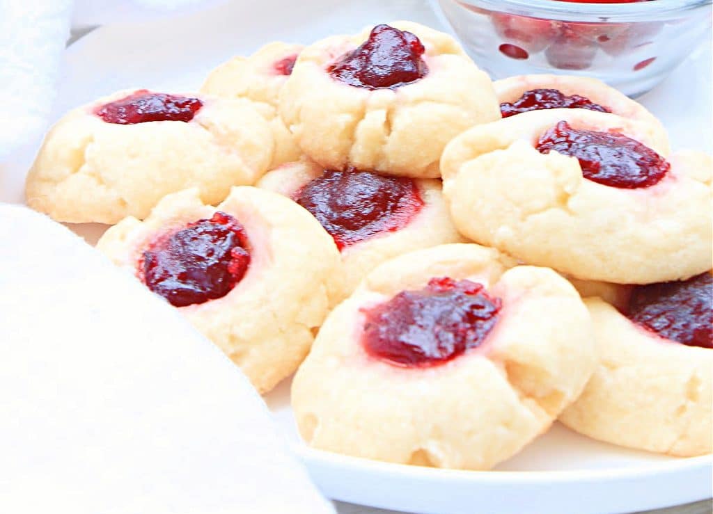 Cranberry Thumbprint Cookies ~ These jewel-toned shortbread cookies are easy to make and perfect for the holiday season!