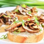 Mushroom Ricotta Crostini ~ Sauteed balsamic mushrooms and creamy ricotta on toasted baguette slices. An easy and elegant appetizer, perfect for the holidays!