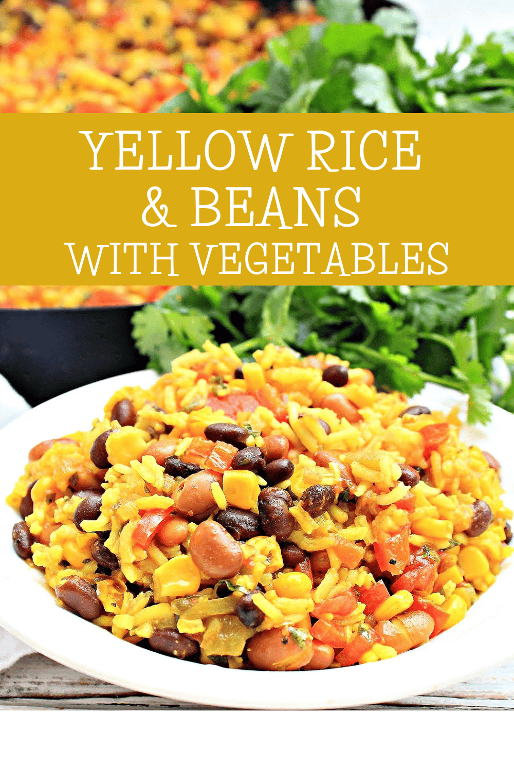 Yellow Rice and Beans with Vegetables ~ Serve this savory dish with black and pinto beans, seasoned rice, and vegetables as a hearty side dish or main course.
 via @thiswifecooks
