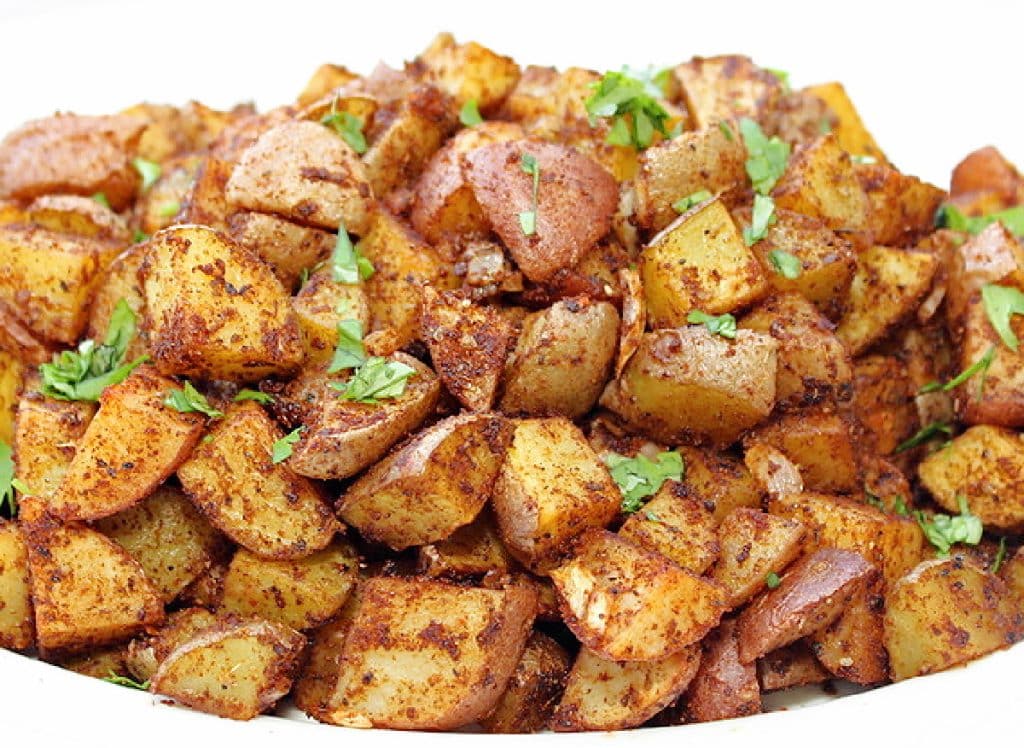 Mexican Potatoes ~ An easy, budget-friendly side dish of crisp roasted potatoes seasoned with a savory blend of spices.