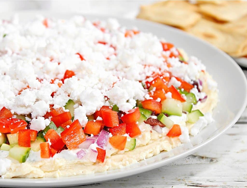 Greek Layer Dip ~ 7 layers of Mediterranean flavors made with all dairy-free ingredients! Ready to serve in 10 minutes!