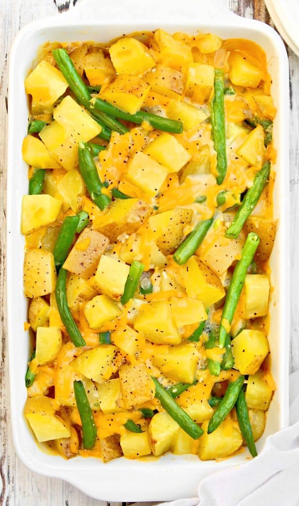 Green Bean and Potato Casserole ~ Fresh green beans and hearty potatoes baked in a savory cheese sauce.