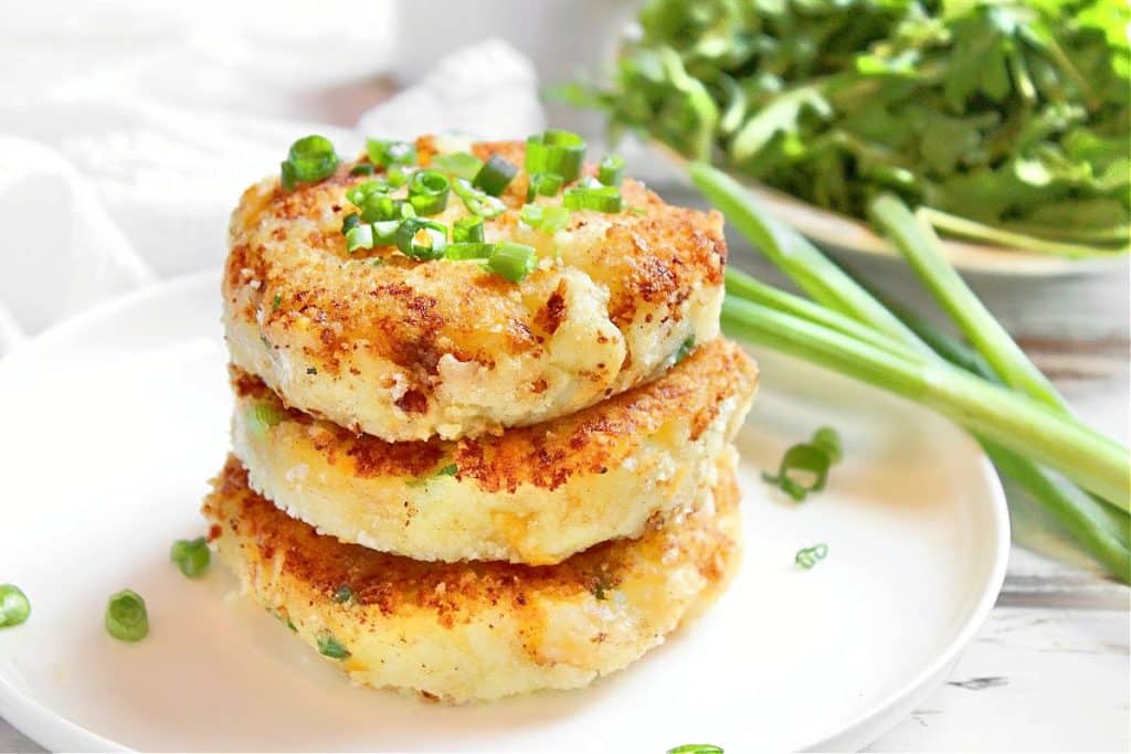 Potato Cakes ~ Savory pan-fried cakes are lightly crisp on the outside and soft on the inside. Serve as a main course or side dish!