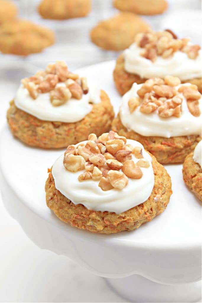 Carrot Cake Cookies ~ All the classic flavors of traditional carrot cake and creamy frosting in a bite-sized indulgence, perfect for Easter brunch!