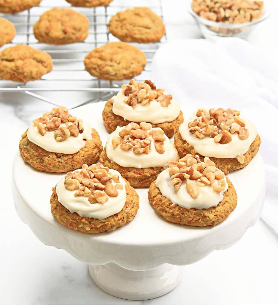 Carrot Cake Cookies ~ All the classic flavors of traditional carrot cake and creamy frosting in a bite-sized indulgence, perfect for Easter brunch!