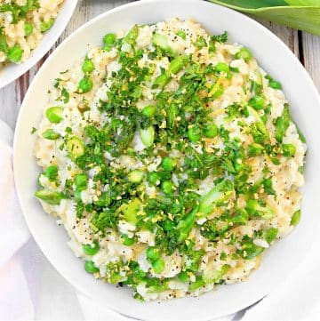Spring Risotto ~ Bright spring vegetables and creamy risotto topped with garden-fresh herbs. Perfect for Easter and springtime gatherings!