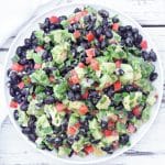 Black Bean Avocado Salad ~ Creamy avocado, protein-packed black beans, crisp peppers, fresh herbs, and tangy lime dressing. This refreshing and healthy salad is easy to make and perfect as a side dish or light lunch!